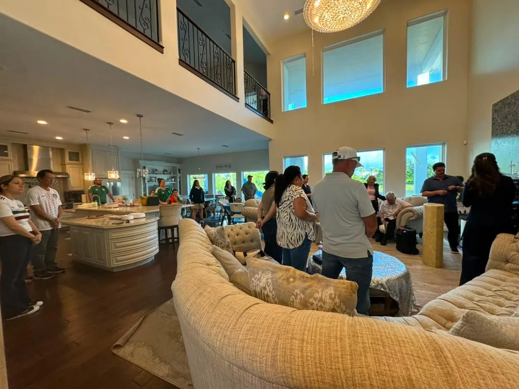 People sharing community during a Ruah home gathering